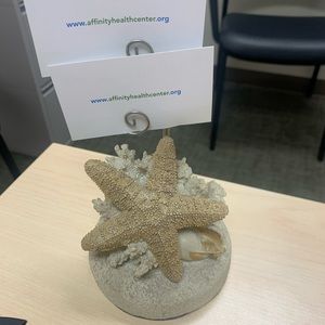 Like new Seashell desktop business card holder.